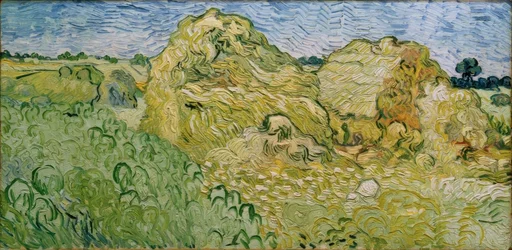 Feld mit Heuschobern